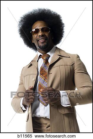 Man with an afro in beige suit Stock Photography | b11565 | Fotosearch