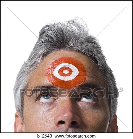 Man with bull's-eye on forehead View Large Photo Image Stock Image - Man with bull's-eye on forehead. Fotosearch