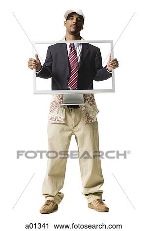 Man with computer monitor and business attire View Large Photo Image Stock Image - Man with computer monitor and business attire. Fotosearch