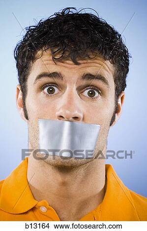 Man with duct tape covering mouth View Large Photo Image Picture - Man with duct tape covering mouth. Fotosearch