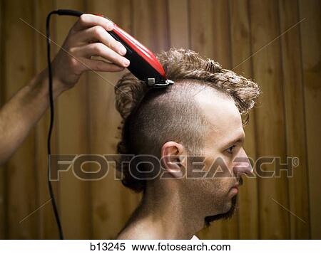 Man with half shaved hair and beard View Large Photo Image Stock Photography - Man with half shaved hair and beard. Fotosearch