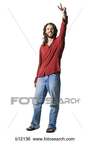 Man with long hair and beard making peace gesture View Large Photo Image Stock Photograph - Man with long hair and beard making peace gesture. Fotosearch