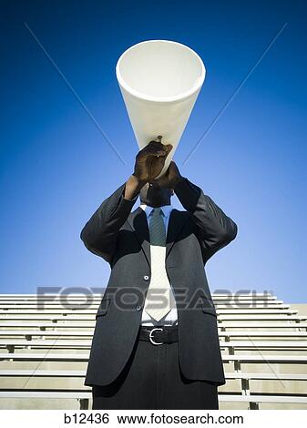 Man yelling through bullhorn View Large Photo Image Stock Photograph - Man yelling through bullhorn. Fotosearch