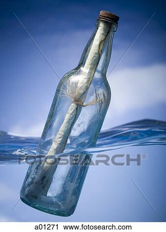 Message in a floating bottle View Large Photo Image Stock Image - Message in a floating bottle. Fotosearch