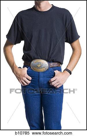 Midsection of slender young man wearing a big belt buckle View Large Photo Image Stock Photography - Midsection of slender young man wearing a big belt buckle. Fotosearch