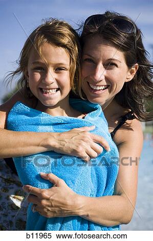 Stock Photography - Mother and daughter at the pool. Fotosearch