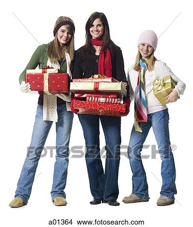 Mother and daughters with Christmas gifts View Large Photo Image Picture - Mother and daughters with Christmas gifts. Fotosearch