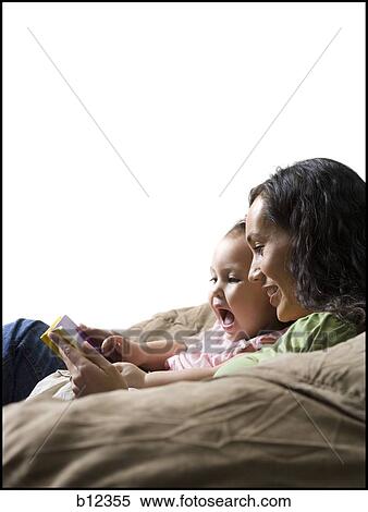 Mother and young daughter View Large Photo Image Stock Photography - Mother and young daughter. Fotosearch