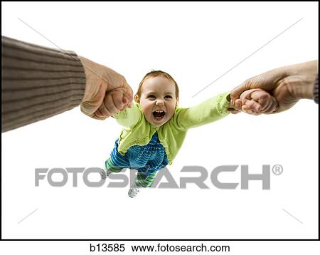 Mother swinging baby girl View Large Photo Image Stock Photography - Mother swinging baby girl. Fotosearch