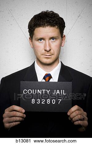 Stock Image - Mug shot of businessman. Fotosearch