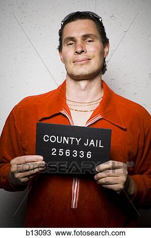 Mug shot of casually dressed man with gold chains View Large Photo Image Stock Image - Mug shot of casually dressed man with gold chains. Fotosearch