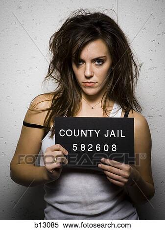 Mug shot of disheveled woman View Large Photo Image Stock Photography - Mug shot of disheveled woman. Fotosearch