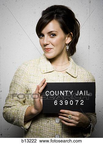 Mug shot of formally dressed woman View Large Photo Image Stock Image - Mug shot of formally dressed woman. Fotosearch