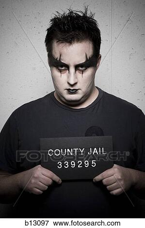 Mug shot of gothic man View Large Photo Image Stock Photo - Mug shot of gothic man. Fotosearch
