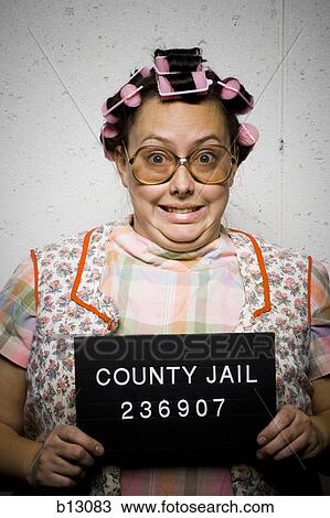 Mug shot of housewife with curlers View Large Photo Image Stock Image - Mug shot of housewife with curlers. Fotosearch