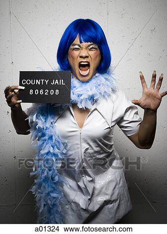 Mug shot of man in dress and feather boa View Large Photo Image Picture - Mug shot of man in dress and feather boa. Fotosearch