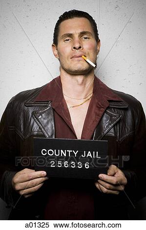 Mug shot of man with cigarette and gold chains View Large Photo Image Stock Photography - Mug shot of man with cigarette and gold chains. Fotosearch