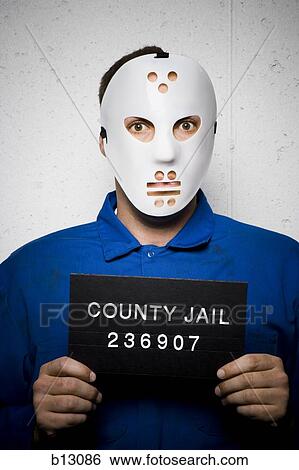 Stock Photograph - Mug shot of man with hockey mask. Fotosearch