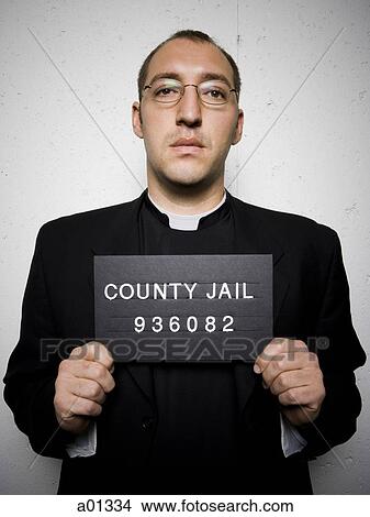 Mug shot of priest with glasses View Large Photo Image Picture - Mug shot of priest with glasses. Fotosearch