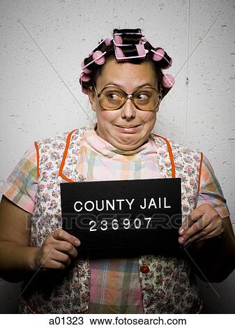 Mug shot of woman in curlers View Large Photo Image Stock Image - Mug shot of woman in curlers. Fotosearch