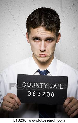 Mug shot of young businessman View Large Photo Image Stock Image - Mug shot of young businessman. Fotosearch