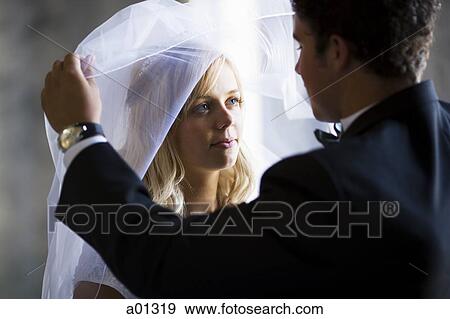 Newlywed bride and groom View Large Photo Image Stock Photo - Newlywed bride and groom. Fotosearch