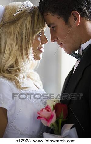 Stock Photo - Newlywed bride and groom. Fotosearch