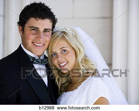 Stock Photo - Newlywed bride and groom. Fotosearch