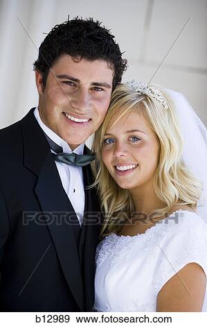 Stock Photo - Newlywed bride and groom. Fotosearch