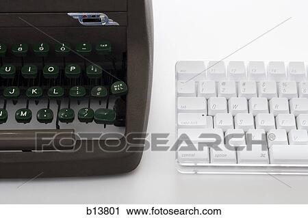 Stock Image - Old typewriter and modern keyboard. Fotosearch