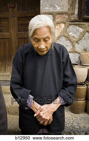 Stock Image - Older Asian woman. Fotosearch
