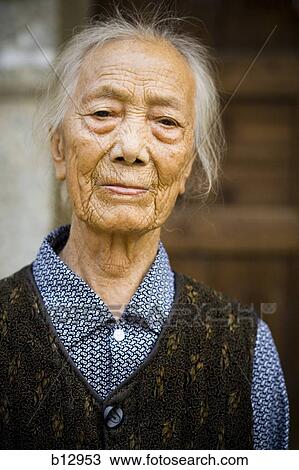 Stock Image - Older Asian woman. Fotosearch