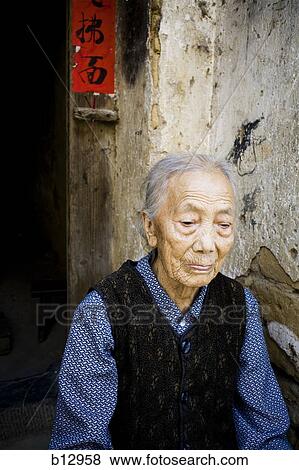 Stock Photo - Older Asian woman. Fotosearch