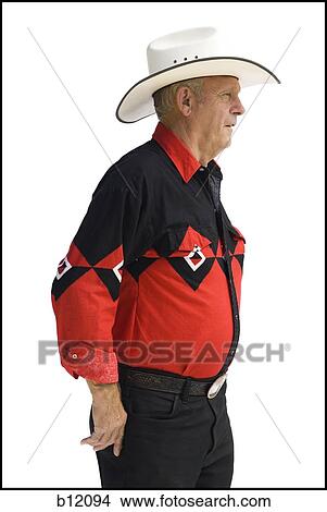 Older man in a western shirt with a cowboy hat View Large Photo Image Picture - Older man in a western shirt with a cowboy hat. Fotosearch