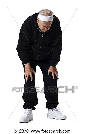 Stock Image - Older man in track suit. Fotosearch