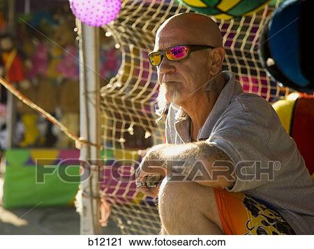 Stock Image - Older man outdoors. Fotosearch