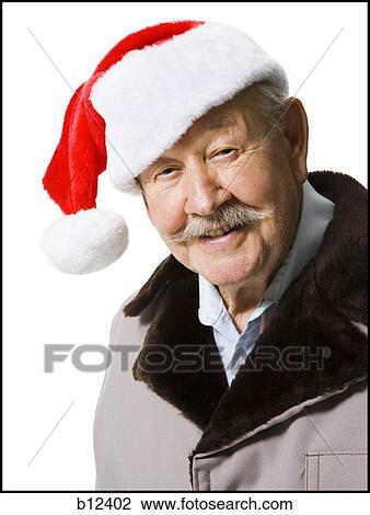 Older man wearing Santa hat View Large Photo Image Stock Image - Older man wearing Santa hat. Fotosearch