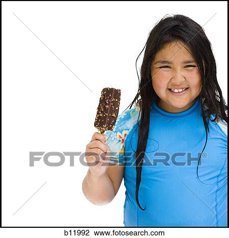 Overweight young girl eating ice cream bar View Large Photo Image Stock Image - Overweight young girl eating ice cream bar. Fotosearch