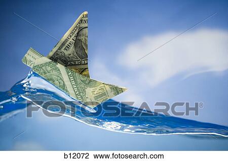 Paper sailboat made of US banknotes View Large Photo Image Stock Image - Paper sailboat made of US banknotes. Fotosearch