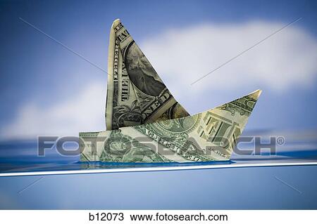 Paper sailboat made of US banknotes View Large Photo Image Stock Image - Paper sailboat made of US banknotes. Fotosearch