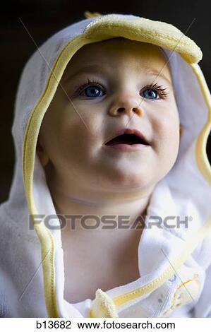 Portrait of a baby looking up View Large Photo Image Stock Image - Portrait of a baby looking up. Fotosearch