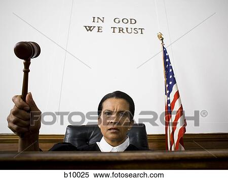 Portrait of a female judge holding a gavel View Large Photo Image Stock Photography - Portrait of a female judge holding a gavel. Fotosearch
