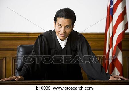 Portrait of a female judge leaning against a bench View Large Photo Image Stock Image - Portrait of a female judge leaning against a bench. Fotosearch