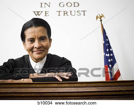 Portrait of a female judge smiling View Large Photo Image Picture - Portrait of a female judge smiling. Fotosearch