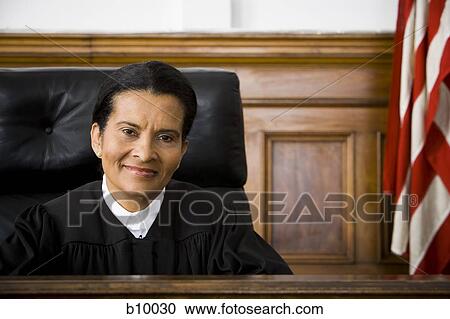 Portrait of a female judge smiling View Large Photo Image Stock Image - Portrait of a female judge smiling. Fotosearch