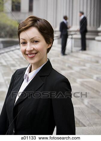 Portrait of a female lawyer smiling View Large Photo Image Stock Image - Portrait of a female lawyer smiling. Fotosearch