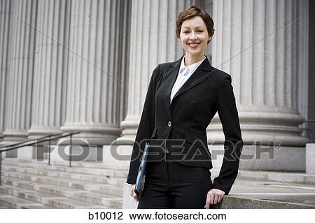 Portrait of a female lawyer smiling View Large Photo Image Stock Image - Portrait of a female lawyer smiling. Fotosearch