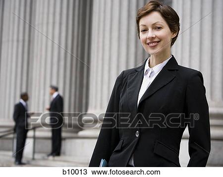 Portrait of a female lawyer smiling View Large Photo Image Stock Image - Portrait of a female lawyer smiling. Fotosearch