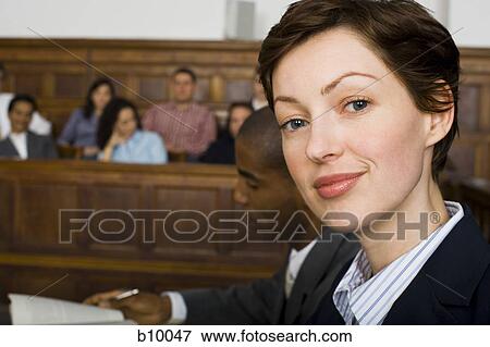 Stock Photo - Portrait of a female lawyer smiling. Fotosearch