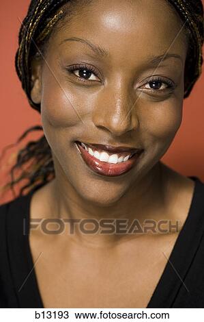 Portrait of a female smiling View Large Photo Image Stock Image - Portrait of a female smiling. Fotosearch